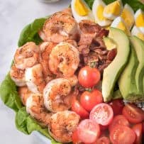A closeup of the salad showing the grilled shrimp