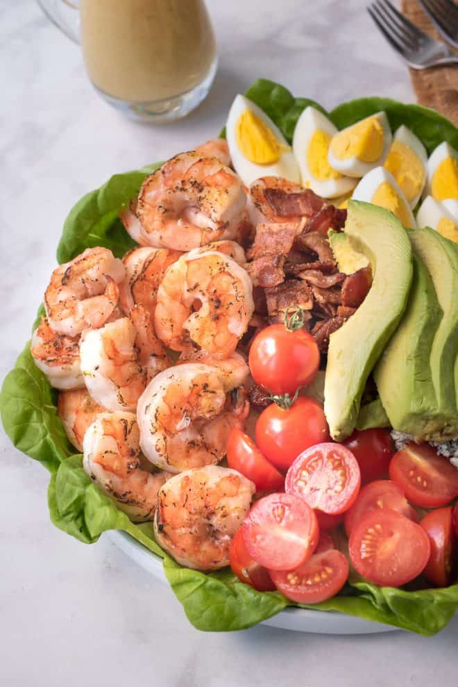 A closeup of the salad showing the grilled shrimp