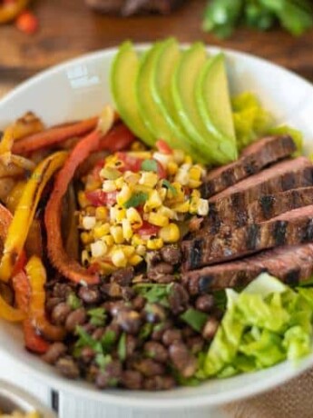 A fajita bowl in a white bowl ready to be eaten