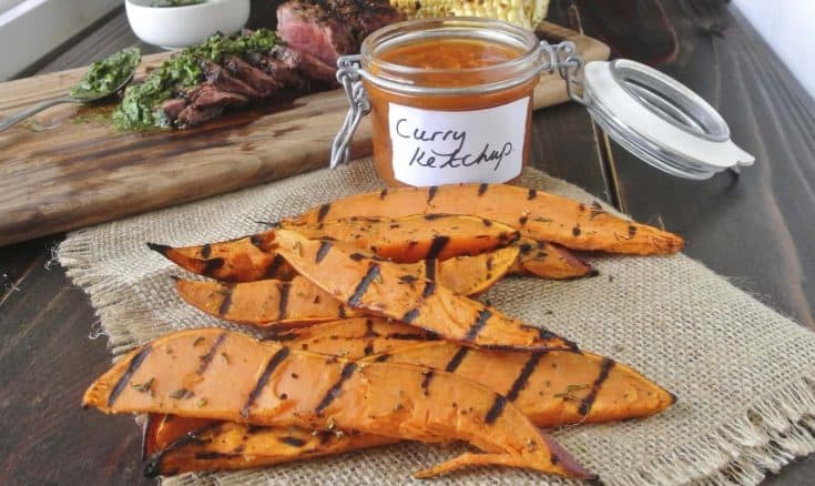 Grilled sweet potatoes served with curry ketchup