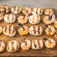 Grilled shrimp and scallop kebobs, lightly seasoned and skewered, the perfect summer dish.