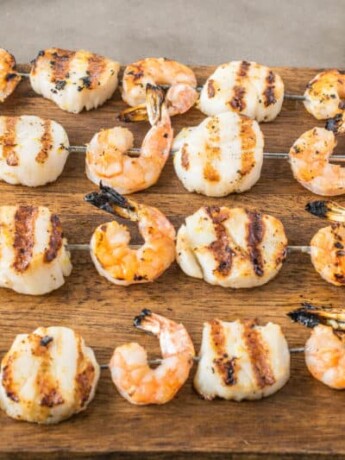 Grilled shrimp and scallop kebobs, lightly seasoned and skewered, the perfect summer dish.