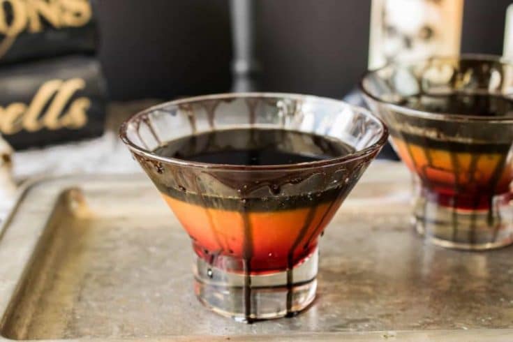 Halloween spooky screwdriver is a fun adult cocktail for everyone's favorite scary holiday with a mocktail option so no one is left out of the frightening fun. Layers of grenadine, orange juice and black colored vodka.