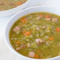 A white bowl of Split Pea and Ham Soup
