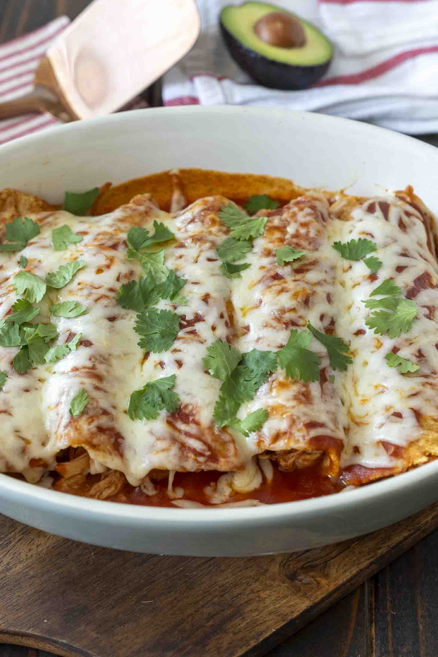 A pan of red sauce enchiladas