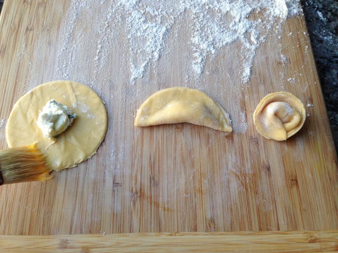 Shaping tortellini pasta