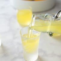 Pouring limoncello into a glass