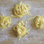 Curled up fresh tagliatelle pasta