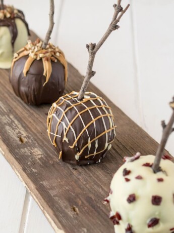 4 chocolate apples with different designs