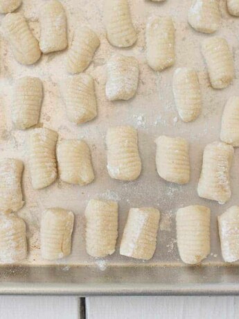 A closeup of gnocchi showing the ridges