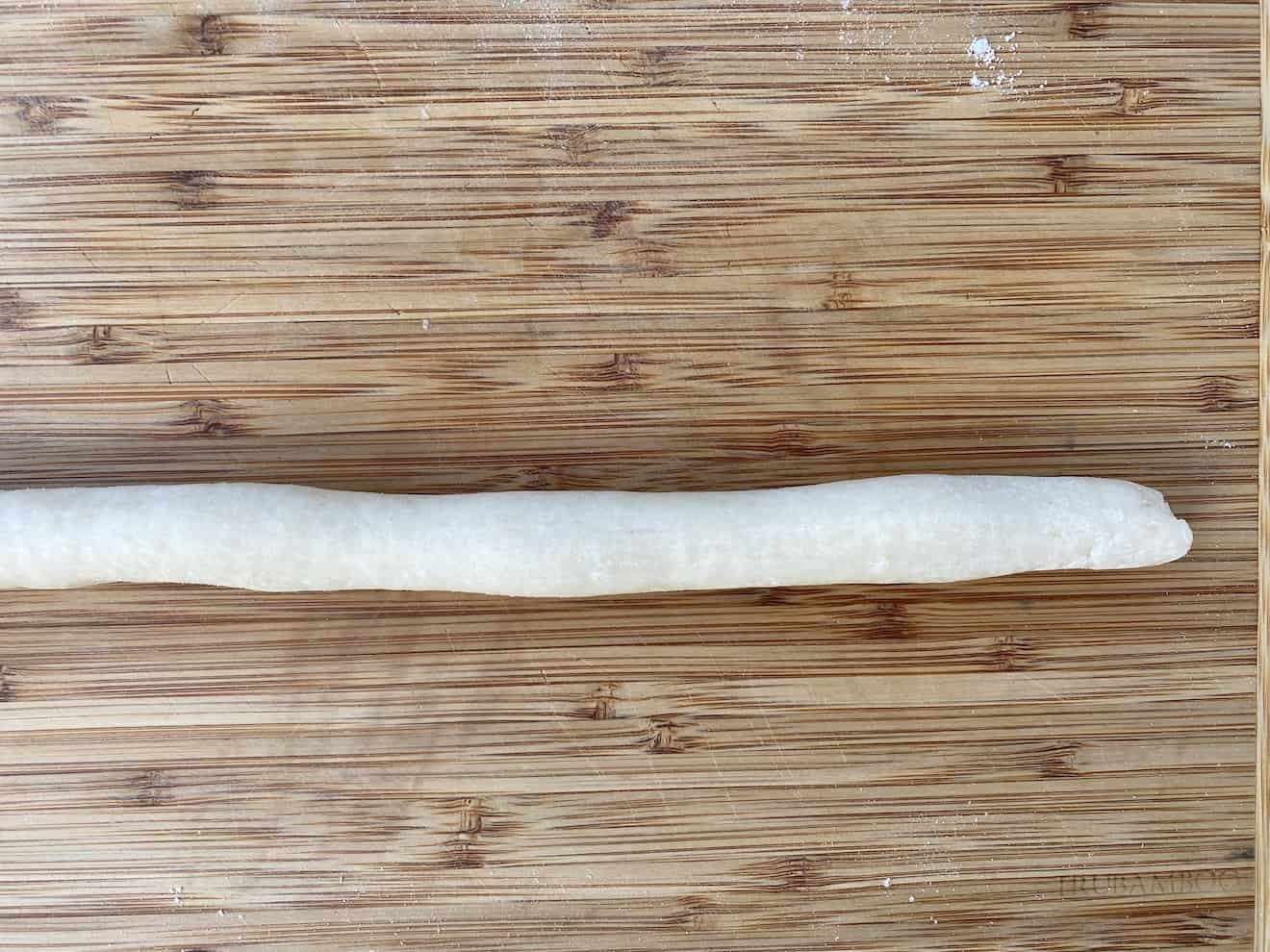 Potato dough rolled out to a long log