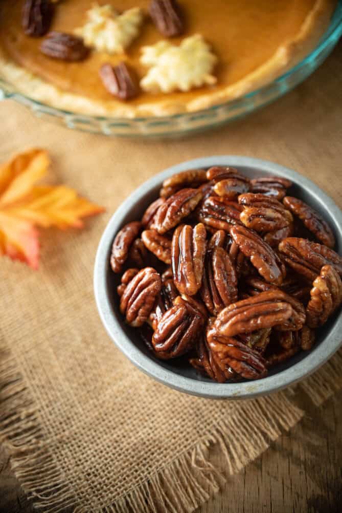 Maple glazed pecans in a silver bowl