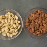 2 bowls of almonds one peeled and one not peeled