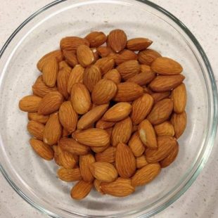 A bowl of raw almonds