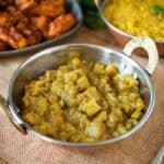 Chunky apple chutney in a sliver bowl