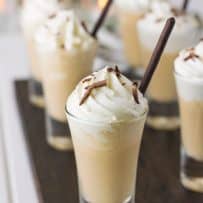 Creamy Irish coffee milkshake topped with whipped cream and shaved chocolate