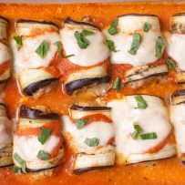 8 eggplant rolls filled with Italian sausage topped with mozzarella in marinara sauce