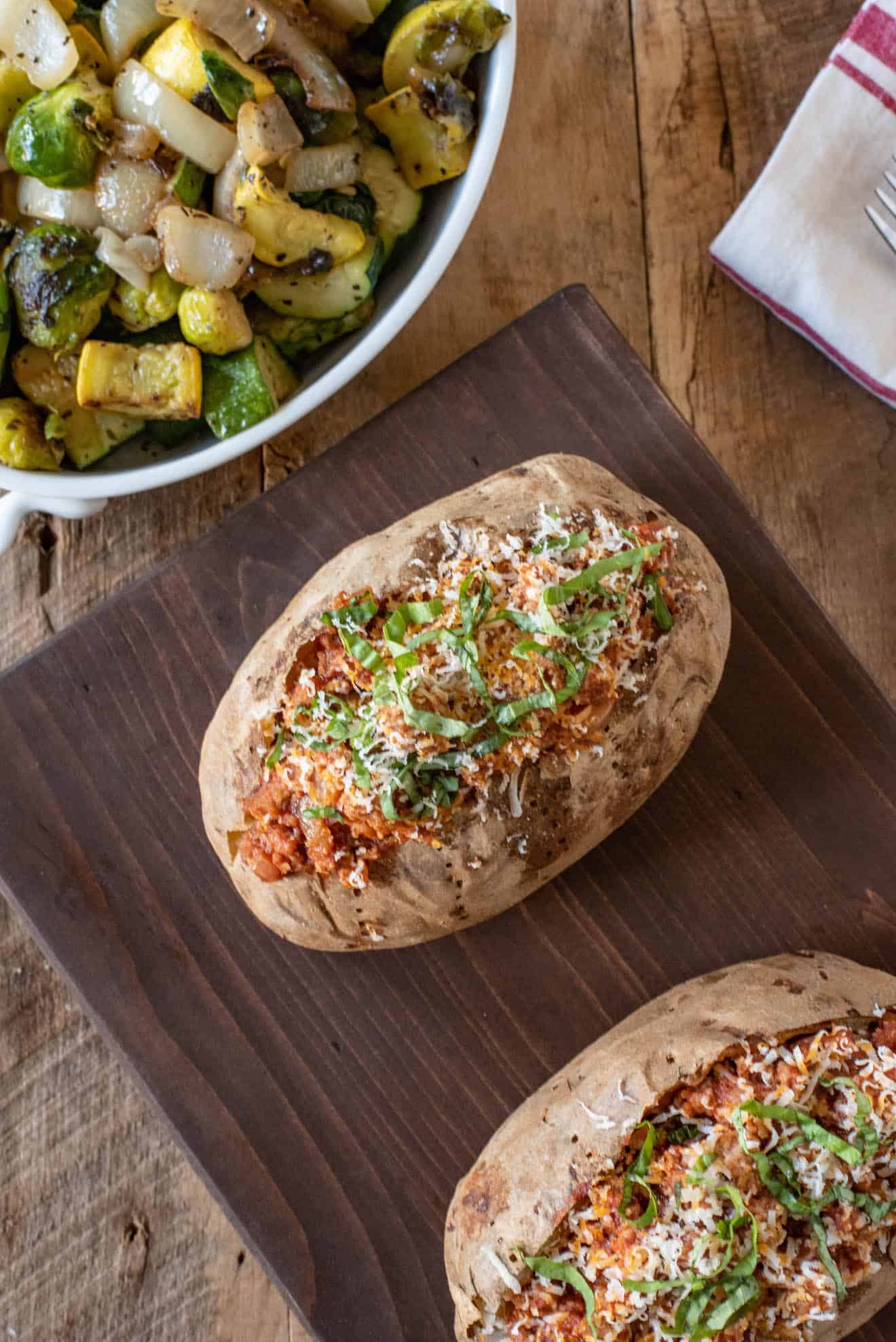 Italian Sausage Microwave Baked Potatoes - Culinary Ginger