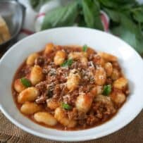 Chunky meat in tomato sauce mixed with gnocchi