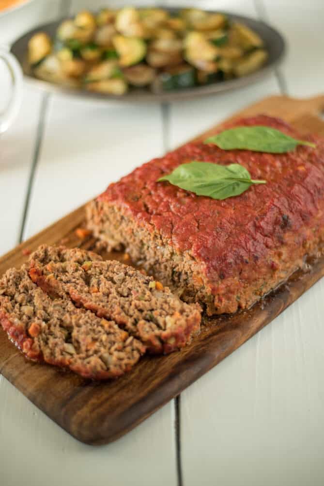 Sliced meatloaf on a serving board