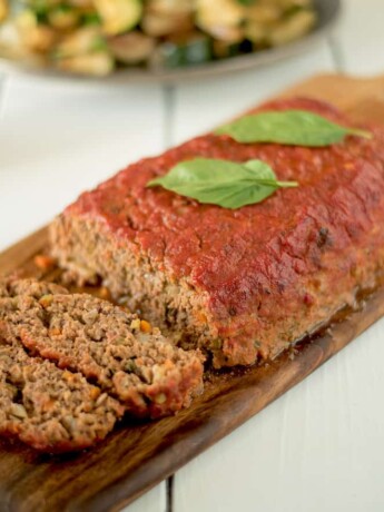 Italian meatloaf coated with pasta sauce