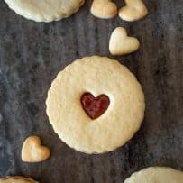 Jammie Dodgers Cookies on a grey serving plate with small heart cookies