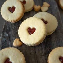 Shortbread cookies with hear cutouts filled with jam