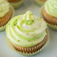 A closeup of the green and white frosting with lime zest