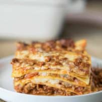 A side view of a slice of lasagna showing the layers