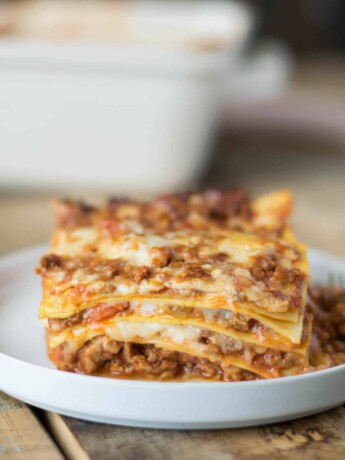 A side view of a slice of lasagna showing the layers