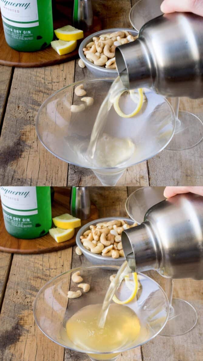 Pouring a drink from a shaker into a martini glass