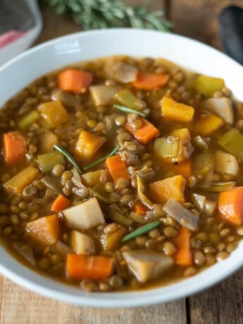 A colorful array of vegetables mixed into lentil soup