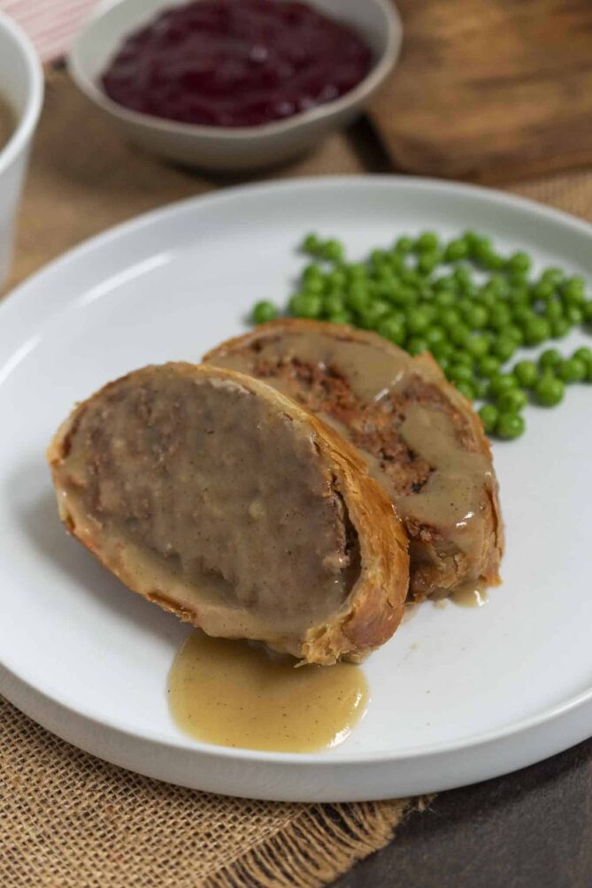 2 slices of meatloaf Wellington covered in gravy