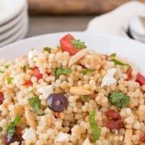 Large pearl couscous mixed with olives, basil and sun-dried tomatoes