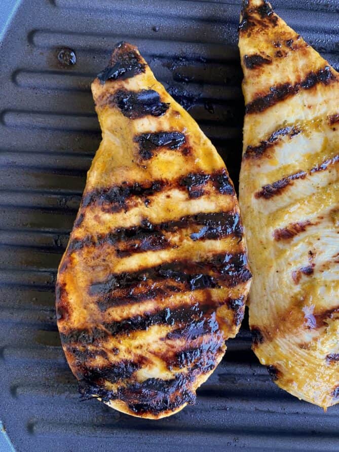 Chicken breasts on a grill