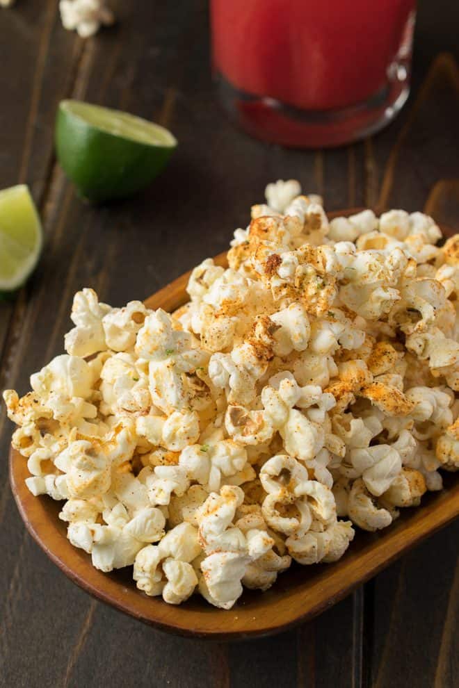 Mexican popcorn garnished with lime zest in a bowl