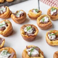 Party size appetizers on a white square plate