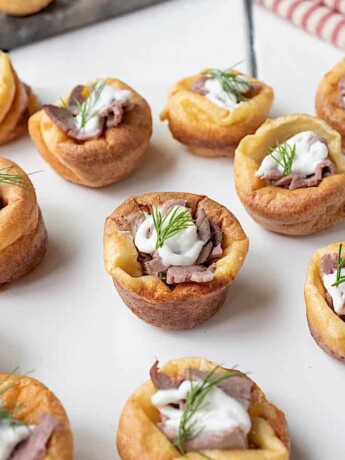 Party size appetizers on a white square plate