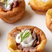 A small Yorkshire pudding/popover filled with roast beef and horserasdish sauce