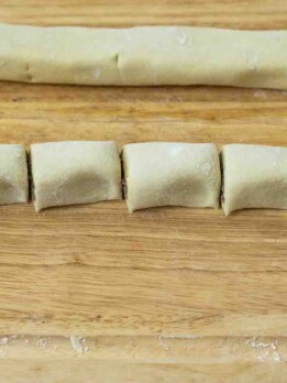 Freshly cut sausage rolls before baking