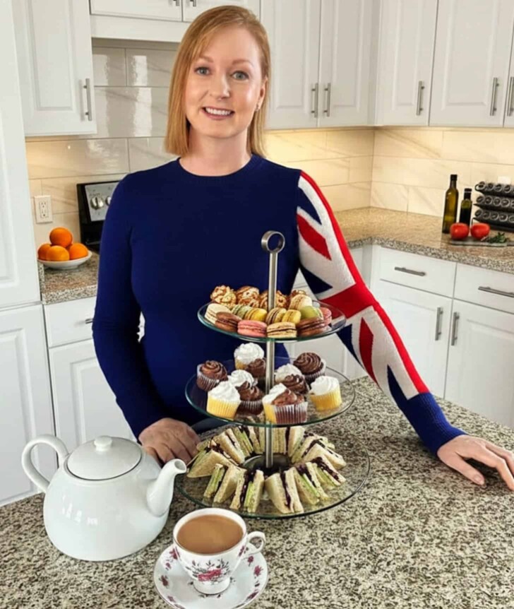 Janette from Culinary Ginger in a kitchen with afternoon tea