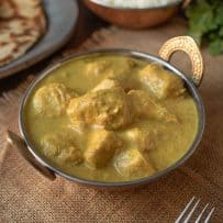 Creamy yellow chicken curry in a bowl
