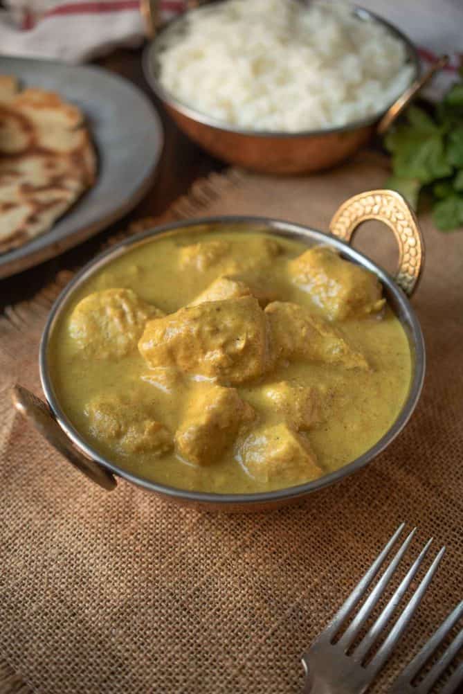 Creamy yellow chicken curry in a bowl