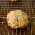An oatmeal cookie with chocolate chips and raisins