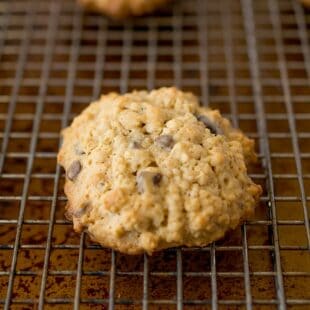 An oatmeal cookie with chocolate chips and raisins