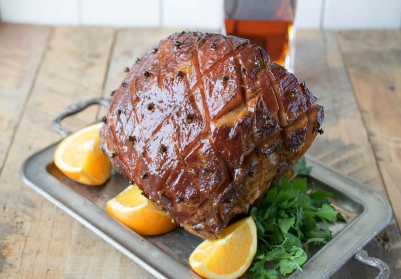Orange & bourbon glazed ham is the star of any holiday table. A perfectly baked ham with a delicious sweet, tasty glaze and a presentation wow factor.