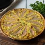 Pear slices fanned on top of a quiche