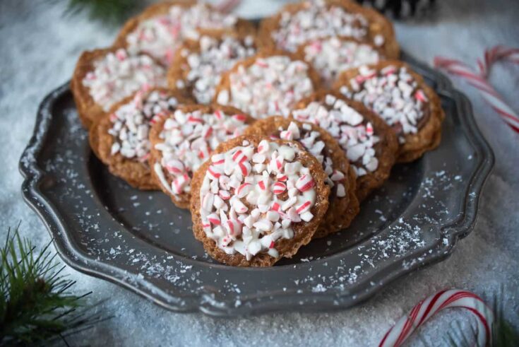 A pewter plate full of peppermint Florentine cookies