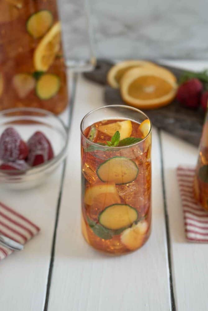 A tall glass filled with Pimm's No. 1 Cup Cocktail for Wimbledon
