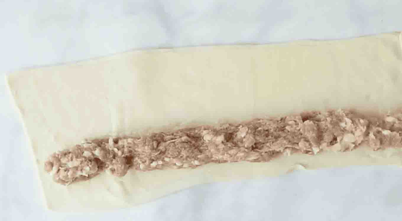 Sausage on puff pastry